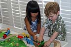 Izabelle and me playing trains at the Woodwards