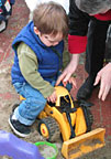 Grandma helps me use the digger